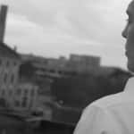 Joshua Millburn looking out at Dayton