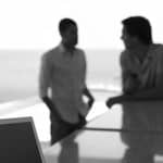 two men talking